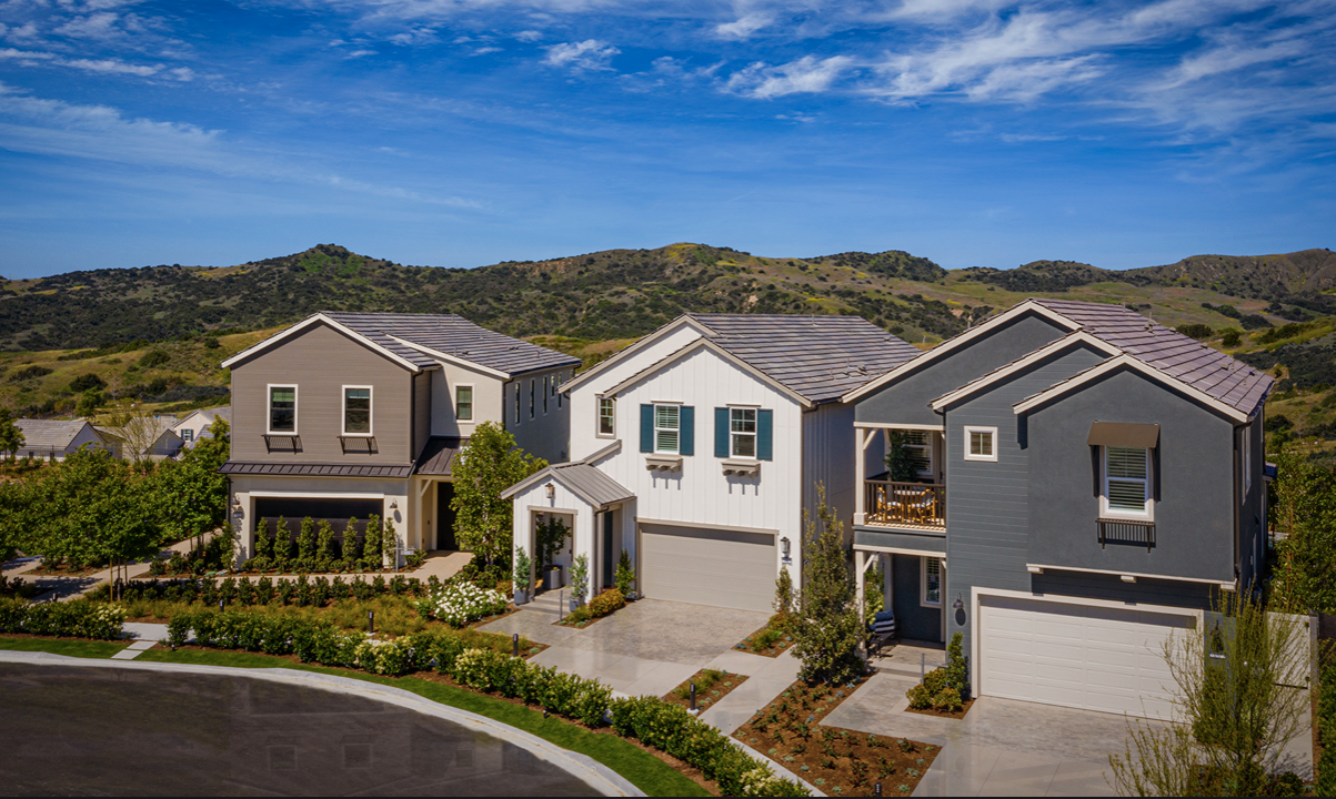 Three California houses with mountains in the background